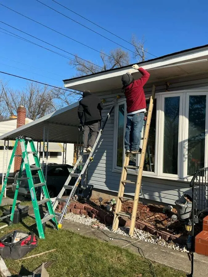 Restoration crew performing exterior repair in East Bay